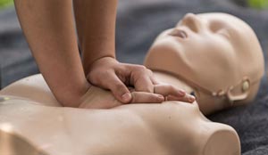 Performing CPR on a Dummy